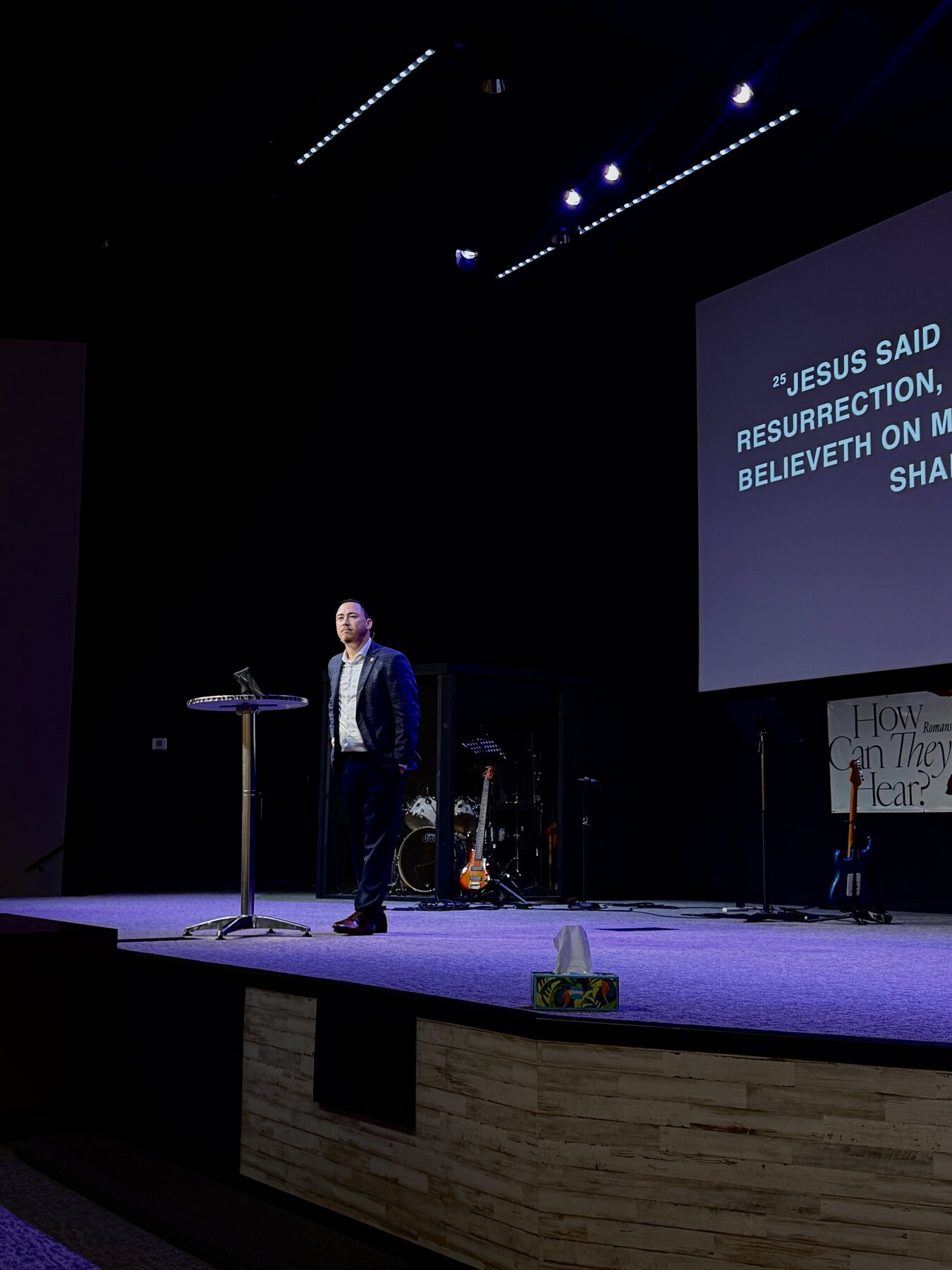 Carlos Figueroa speaking on stage